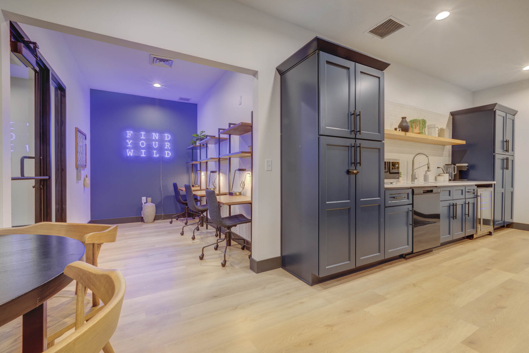 Clubhouse lounge with private desks and chairs